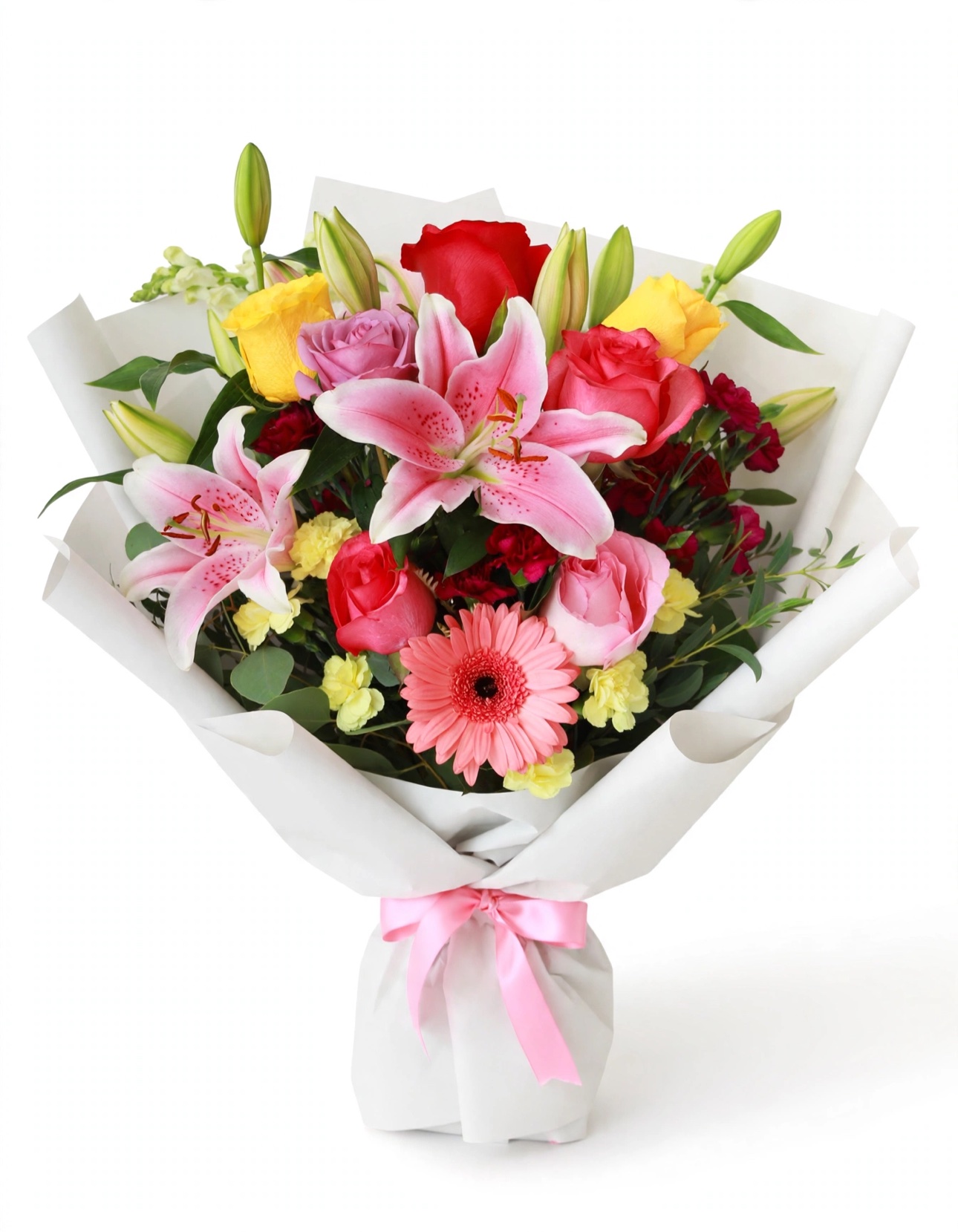 Florist Choice — a mixed bouquet of lilies, roses, gerbera daisies, and carnations in white wrap, tied with a soft pink satin bow